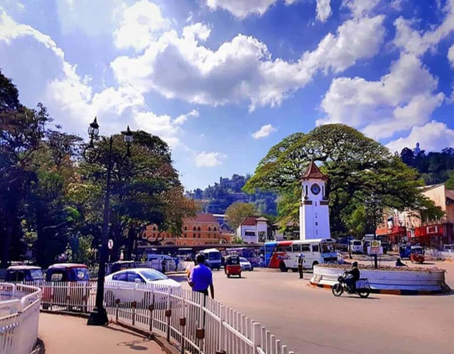 Kandy: City Explore with Local Guide By Tuk Tuk - Bahirawakanda Buddha statue: stairs, views, and a big faith stop