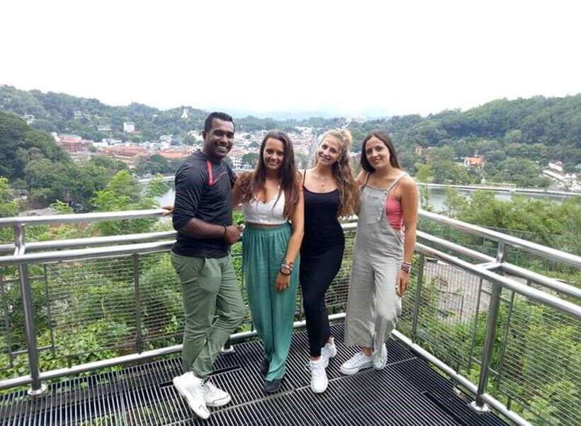Kandy City Tour & Ambuluwawa Tuk Tuk Adventure - Royal Botanical Garden Peradeniya: where the pace slows down